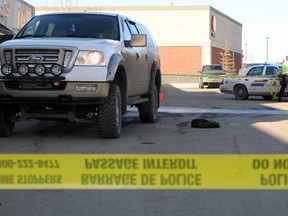 A 59-year-old woman was rushed to hospital with life threatening injuries after being hit by this white Ford 4x4 truck outside the south side IGA at 3:10 p.m. on Wednesday. She has since been moved to an Edmonton hospital and her condition is described as critical, but stable. (Patrick Callan/Daily Herald-Tribune)