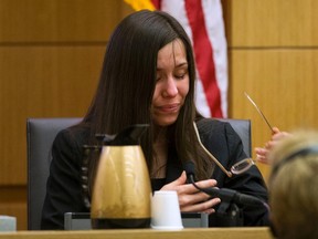 Jodi Arias breaks down after being asked by prosecutor Juan Martinez if she was crying when she stabbed Travis Alexander and when she slit his throat, in Maricopa County Superior Court in Phoenix, Arizona, February 28, 2013. REUTERS/Tom Tingle/The Arizona Republic/Pool
