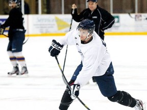 In this file photo from the North Bay Nugget, Brett Cook of the Nipissing Lakers unleashes a cannon from the point during a practice at Memorial Gardens.