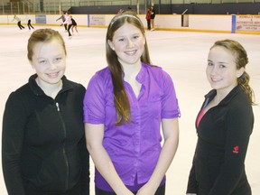 Ingersoll Skating Club program assistants Presley DeBruyn, 15, left, Sarah Bittorf, 16, centre, and Sara Seys, 15, right, will be volunteering at the International Skating Union World Figure Skating Championships at Budweiser Gardens in London, Ont., March 11 to 17, 2013. Seys and DeBruyn will patch the ice in between routines and Bittorf will assist with medal ceremonies. JOHN TAPLEY/INGERSOLL TIMES/QMI AGENCY