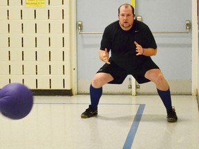 Dip, duck, dive, dodge. The first place team and the second place team part of the Saugeen Shores Dodgeball League, battled it out during a long over due game on Tuesday at Northport school, which saw the Osama Bin Dodgin’s win 16-9 over the Basra Honey Badgers. Music playing, adults throwing balls at one another, all the while getting a good workout, makes for a great Tuesday evening. Pictured is Rob Fawcett of the Basra Honey Badgers preparing himself to catch the dodgeball that was thrown at him by an Osama Bin Dodgin’ player.