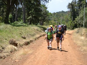 Members of Project Kenya take a stroll during their three-week adventure that involved a safari, a school-building project, and a climb of Mount Kenya. PHOTO BY NATASHA THOMPSON/FOR THE OBSERVER/QMI AGENCY