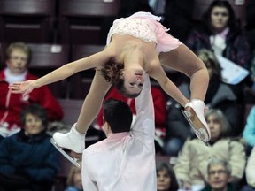 Local pairs skaters, Michael Marinaro, 21, of Sarnia and Margaret Purdy, 18, of Strathroy, pictured at the Canadian Figures Skating Championships in January, finished their final junior season with a silver medal performance at the world junior figure skating championships Thursday night. (FRED THORNHILL/ REUTERS)