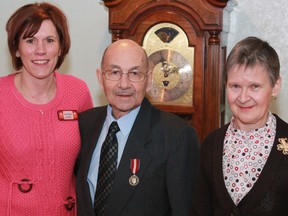 Dousithé Robichaud was awarded the prestigious Queen Elizabeth II Diamond Jubilee medal for his selfless efforts on behalf of the Golden Manor and Canadian Cancer Society. Robichaud has been shuttling seniors around the city for six years and providing much needed transportation to Sudbury for cancer patients. On hand for the presentation are, from left, Sue Walton,  Dousithé Robichaud and Velna Kauhala.