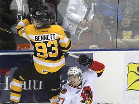 The Kingston Frontenacs' Sam Bennett collides with Daniel De Sousa of the Belleville Bulls against the boards during Friday night's OHL game at the K-Rock Centre.
Michael Lea The Whig-Standard