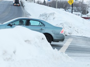 The sight line from Van Horne Street turning onto the Bridge of Nations is blocked due to the high snow banks.
GINO DONATO/THE SUDBURY STAR