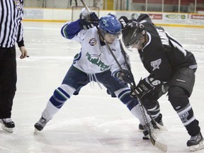 The Melfort Mustangs' Sheldon Argent looks to win a faceoff with Travis Marit of the Battlefords North Stars during Melfort's 7-4 win on Staurday night at the Northern Lights Palace.