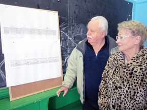 MONTE SONNENBERG Simcoe Reformer
Bill Maxwell and Betty Keene of Simcoe attended North Public School during the Second World War. Saturday, they checked out plans for the new townhouses that will be built on the grounds once the 86-year-old structure is demolished this spring.