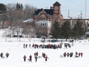 Great Canadian Canoe Race teams are off to a running start as they head across the ice for open water at the annual Kenora Winter Carnival event on the Harbourfront, Sunday, March 3.