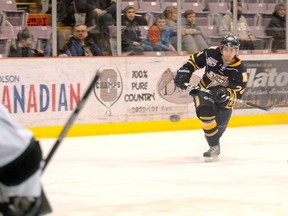 Storm forward Adam Boytinck fires a hard wrist shot at Crusader goalie Jacob Suppes during Friday night’s game. The Grande Prairie Storm beat the Sherwood Park Crusaders 4-2.  The victory wrapped up second place in the AJHL North Division for the Storm, who will open the playoffs against the Crusaders. (TERRY FARRELL/DAILY HERALD-TRIBUNE)