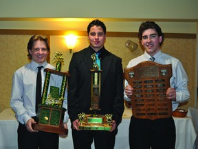 Left to right: Bryce Lipinski, Kajon McKay and Tyler Harland pose with their awards Saturday night. McKay was named team MVP as well as receiving a fan appreciation award, Lipinski was named Outstanding Team Player and Harland was named Best Defensive Defenceman and given a scholarship by the  Portage Minor Hockey Association. (Clarise Klassen/PORTAGE DAILY GRAPHIC/QMI AGENCY)