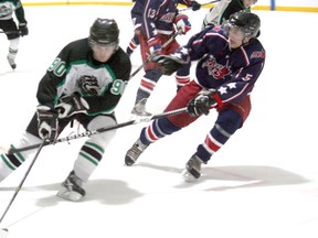 The Ripley Wolves hosted the Elora Rocks for game four of their playoff series on Saturday, March 2, 2013. The Wolves would drop both weekend games to the Rocks, going down 3-1 in the best of seven. Here, Ripley's Tim Dwinnell looks to cut outside of Zack Fray of Elora. Game five goes in Elora, which the Wolves must win to keep the series alive for game six on Sunday, March 10 in Ripley.