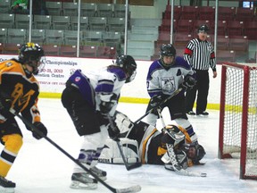 Beaver Brae’s Andrea Johnson and Ainsey LIndquist watch the Fort Frances goalie waiting for the puck to slip out from under her stick. The Bronco girls lost to the Muskies 5-1.
GRACE PROTOPAPAS/Daily Miner and News