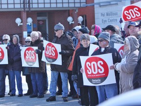 About 75 people participated in Monday's Save Our Services rally at Petrolia's Charlotte Eleanor Englehart Hospital of Bluewater Health. The rally was organized by the Sarnia-Lambton Health Coalition to protest hospital cuts and hospital underfunding. (DAVID PATTENAUDE/QMI AGENCY)