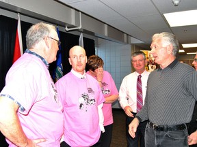 Albert Schalm, (l), Northern Gateway School Division trustee for Mayerthorpe, and Jim Govenlock, (r), trustee for Whitecourt, talk to Education Minister Jeff Johnson about some of the issues the division is facing.
Barry Kerton | Whitecourt Star