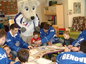 Members of Sudbury's favourite hockey team stopped by the Children's Treatment Centre at Health Sciences North on Monday, to visit young patients, pose for photos and give out Sudbury Wolves Hockey cards. (Supplied photo)