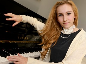 Carley Allison, 17, is seen at her Toronto home Monday, March 4, 2013. The student at Bayview Glen was recently diagnosed with a very rare one in a billion form of cancer. The aspiring singer/writer is using her music to create awareness. (Dave Thomas/Toronto Sun)