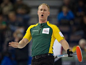 Northern Ontario skip Brad Jacobs reacts to his shot during play against Newfoundland at the Canadian Men's Curling Championships in Edmonton, Alberta March 4, 2013. REUTERS/Andy Clark (CANADA - Tags: SPORT CURLING)