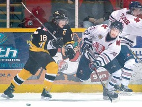 SCOTT WISHART  The Beacon Herald
Waterloo Siskins captain Adam Campagnolo battles Stratford Cullitons captain Andrew Barton during Game 3 of their GOJHL Midwestern Conference quarter-final series at the Allman Memorial Arena Monday night. The Cullitons won 3-1.