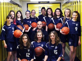 The Holy Family Catholic French Immersion Hornets girls' basketball team, with head coach Justin Trepanier, went undefeated in the regular season before falling in the playoffs to London's St. Sebastian Catholic school last week. With three Grade 6's, two Grade 7's and 10 Grade 8's, the Hornets were the top girls' basketball team among Oxford County elementary schools. (GREG COLGAN, Sentinel-Review)