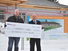 From left to right are Duncan Hawthorne, Bruce Power CEO and Andy Swan, Community Living Kincardine and District's executive director. Community Living Kincardine and District will receive a financial boost of $250,000 from Bruce Power to assist with its Inspiring Possibilities ‘Here at Home’ Capital Campaign.