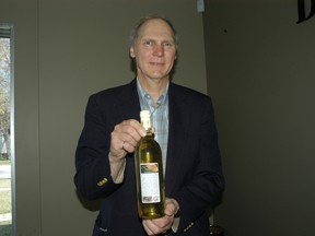 Mitchell Omichinski, from Portage la Prairie, shows his famous Maple Mead he won top prize for at the Great Manitoba Food Fight during a visit to the Herald-Leader on April 23, 2010. (FILE PHOTO)