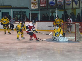 Travis Jones of the Blind River Beavers takes a shot on the Bobcats’ net, which netminder Cory Simic blocks.
Photo by KEVIN McSHEFFREY/THE STANDARD/QMI AGENCY