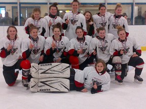 The Paris District High School girls hockey team celebrates its 3-0 win against Walkerton's Sacred Heart in Walkerton on Tuesday, March 5, 2013 to earn a place at the Ontario Federation of School Athletic Associations A/AA championships in Orillia from March 18-21. SUBMITTED PHOTO