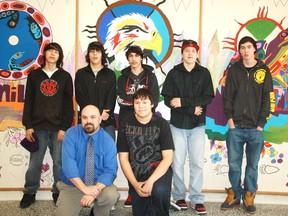 The student in this year’s Ravens Program at Espanola High School and their teacher Jayson Stewart are along side the Seven Grandfathers mural they are currently working on.  
Photo by Amanda Johnson/ Mid-North Monitor/QMI Agency