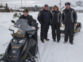 Mike Tombs  • for Northern News
Kirkland Lake Const Bill Nabb along with Chris Bullerdick, Tracy Jo Chernuck and Wayne Chinnery of the OFSC Snowmobile Trail Officer Patrol are pictured at Hockey Heritage North during the Poker Run held this past Saturday.