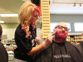 Local radio personality Jerry Neville was one of the first in line to have his hair — and beard and eyebrows — dyed a shade of fluorescent pink Tuesday morning, as the Hair Massacure event kicked off in Fort McMurray, raising funds for three Alberta children’s charities. JORDAN THOMPSON/TODAY STAFF