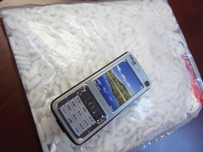 A taser that looks like a cellular phone and about 2,000 speed pills were seized over the weekend  in Cornwall, with an estimated value of about $10,000. 
Staff photo/ERIKA GLASBERG