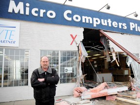 David Dunsworth stands in front of his business, Micro Computers Plus on 117 Avenue, on Tuesday At approximately 4:30 a.m. Tuesday morning a thief crashed a pickup truck into the front door of his business and stole computer tablets. Dunsworth believes the criminal or criminals got away with approximately $1,500 worth of merchandise.  RCMP are investigating. (Aaron Hinks/Daily Herald-Tribune)
