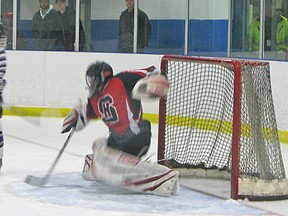 Sacred Heart goalie Craig Takken stopping a shot during the Crusaders’ A/AA CWOSSA championship game against Centre Dufferin on Tuesday.