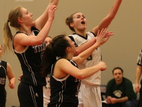 The Harry Ainlay Titans and Spruce Grove Panthers battle in the Edmonton Public senior women's basketball Tier 1 championship game at Jasper Place school on March 2, 2013. Photo by Gord Montgomery/QMI Agency