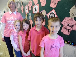 Students at St. Frances Cabrini School wore pink last Wednesday to mark Pink Shirt Day,  to symbolize they are against bullying.  Wearing pink, from left to right, are Grade 2 teacher Leanne Howse and students Lauren Barber, Jayden Smith, Marques Ferreria and Griffyn Kochany. (SARAH DOKTOR Delhi News-Record)