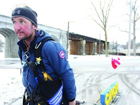 Mike Duhacek is walking across Ontario, pulling a heavy sled behind him that represents the weight that cancer places on the lives of Canadians.