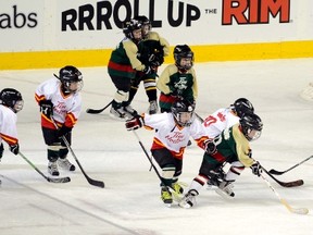 The Cochrane Dragons scrimmaged at the Saddledome during the first intermission of the Mar. 3 Flames game.