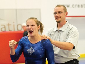 Airdrie Edge Gymnastics head coach Jamie Atkin, seen here with Corissa Boychuk, was one of several professional amateur coaches addressing a federal committee. 
JAMES EMERY/AIRDRIE ECHO FILE PHOTO