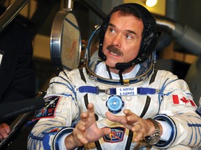 Canadian astronaut Chris Hadfield, speaks with a journalist during his pre-flight preparation at the Cosmonaut Training Centre in Star City, outside Moscow, in November, 2012. Hadfield, now in space, will host a video downlink on March 11 with BCHS. 
ALEXANDER NEMENOV/AFP PHOTO