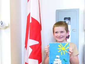 Ezra Peters and his stamp design - a sailboat on the sea