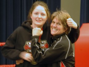 Sarnia boxing product Kaitlyn Clark, left, and coach Jill Perry of the Beaver Boxing Club in Ottawa. Clark, 20, won the Ontario provincial championships this weekend. SUBMITTED PHOTO