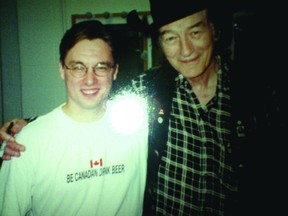 A then 28-year-old Derek Gordanier, left, and Stompin' Tom Connors following the singer's concert in Cornwall in 1999.