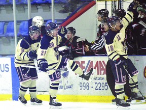 The Wetaskiwin Icemen celebrate a goal in front of the Fort Hawks’ bench on Friday, March 1 on their way to a 7-2 win that effectively ended the local boys’ season.

Photo by Aaron Taylor/Fort Saskatchewan Record/QMI Agency
