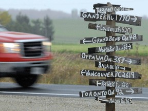 A creative and quite comprehensive road sign points the way for drivers just east of Stratford, Ont. along Highway 7 and 8 on Monday, Oct. 15, 2012. (SCOTT WISHART/QMI Agency)