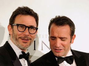 Last year’s winner for Best Director for 'The Artist' Michel Hazanavicius and Actor Jean Dujardin, winner of the Best Actor Award for 'The Artist,' show off their Oscars after the Academy Awards in 2012.
Frazer Harrison/Getty Images/AFP