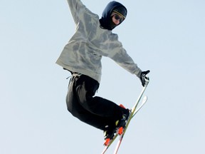 Ryley Williams and other members of the Northern Extreme Freestyle Ski Club team practised Saturday at Nitehawk Recreation Area in preparation for the junior national freestyle skiing championships later this month. TERRY FARRELL/DAILY HERALD-TRIBUNE