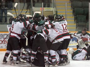 The South Side Athletic Club Midget AAA hockey team went crazy after staving off elimination with a 1-0 victory over the Sherwood Park Kings in a game that took five overtime periods to decide on Wednesday night at the Arena. Photo by Shane Jones/Sherwood Park News/QMI Agency