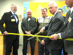 The official ribbon cutting at Bee Maid Honey in the Grove took place this past week.