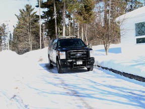 A OPP vehicle leavng the scene at the Norman Dam, one f several vehicles that have been coming and going from the dam all day.  
ALAN S. HALE/Daily Miner and News